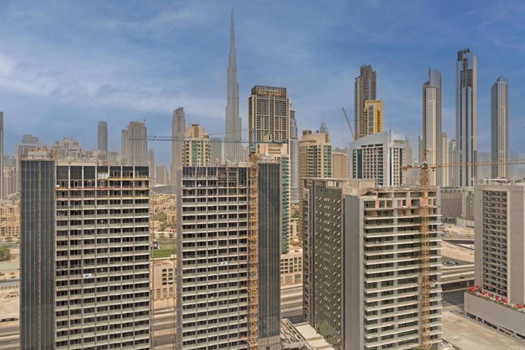 Апартаменти Brand New 1Br- Business Bay - Burj Khalifa View Дубай Екстер'єр фото